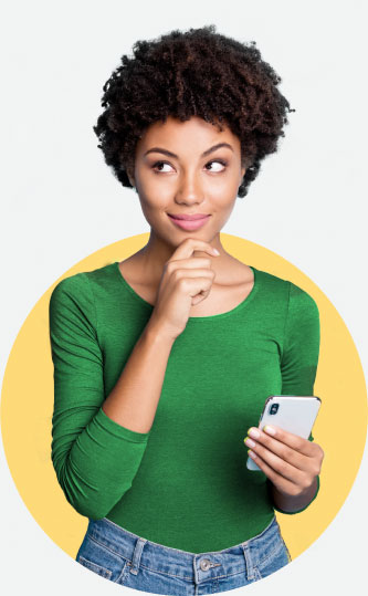 Young woman in green shirt holding smartphone.